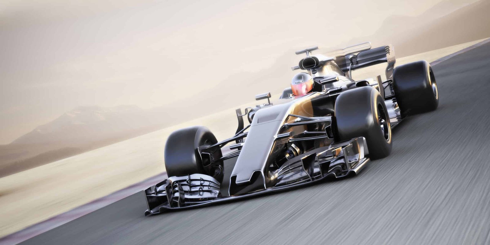 Monoplace de course sombre lancée à pleine vitesse sur l'asphalte d'un circuit, arrière-plan flou de vitesse