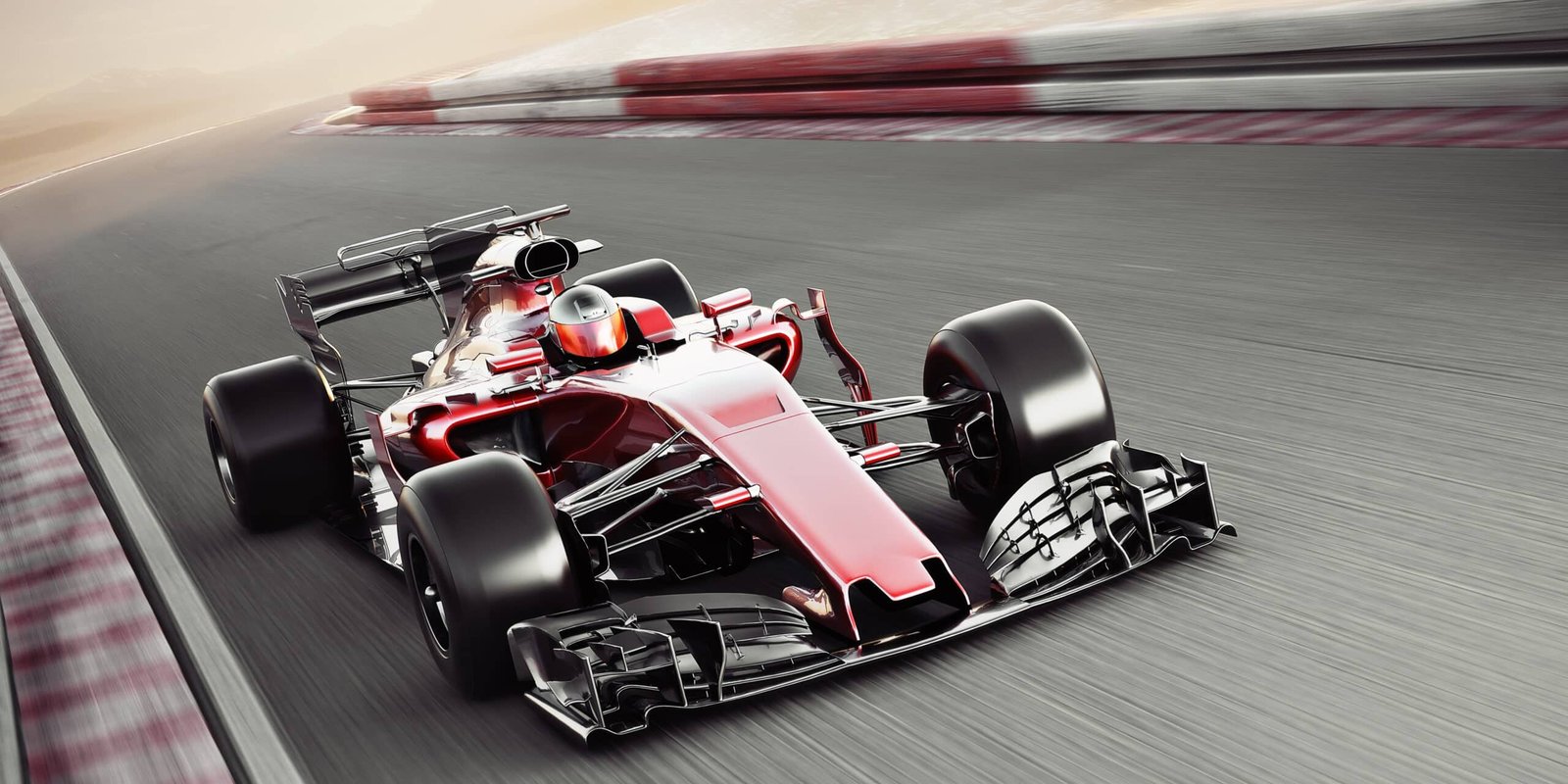Monoplace rouge et noire lancée à pleine vitesse sur un circuit, vibreurs rouges et blancs en arrière-plan